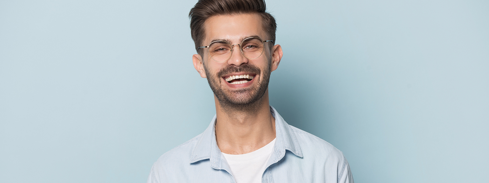 A photo of a man with a healthy smile and excellent dental care.